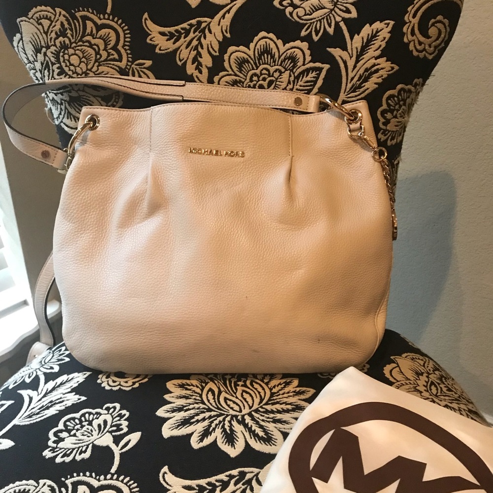 Cream colored Michael Kors handbag
